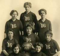 the 1913 champion Hamline women's basketball team, posing around a basketball