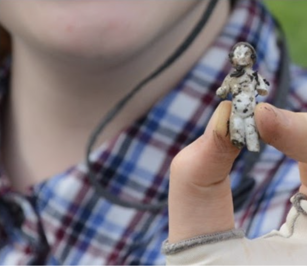 Ceramic doll recovered during HUCAS excavation