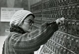 An unidentified Hamline post office worker in 1975, a black and white image from the archives