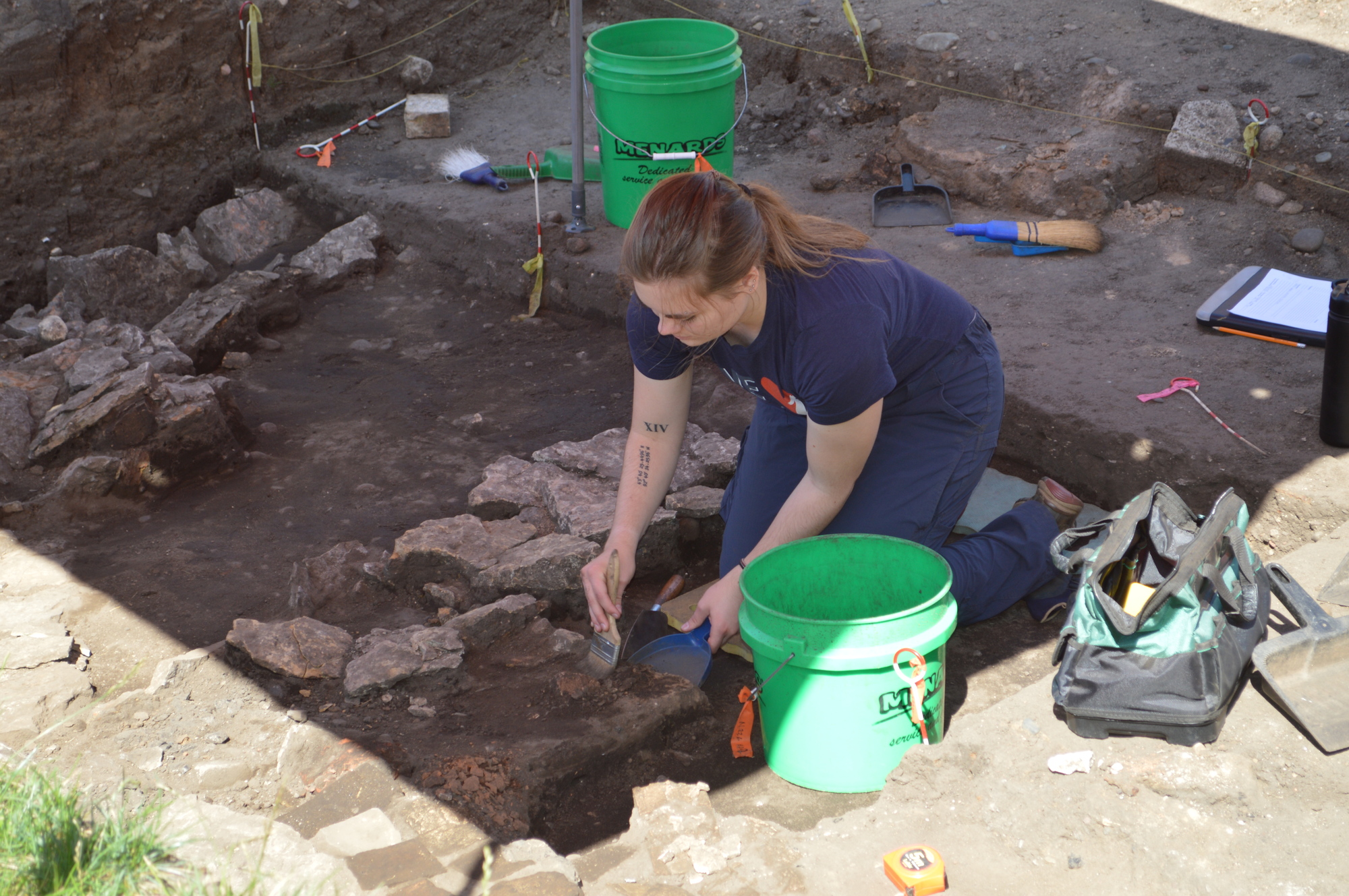 Anthropology, student excavating during Hamline dig