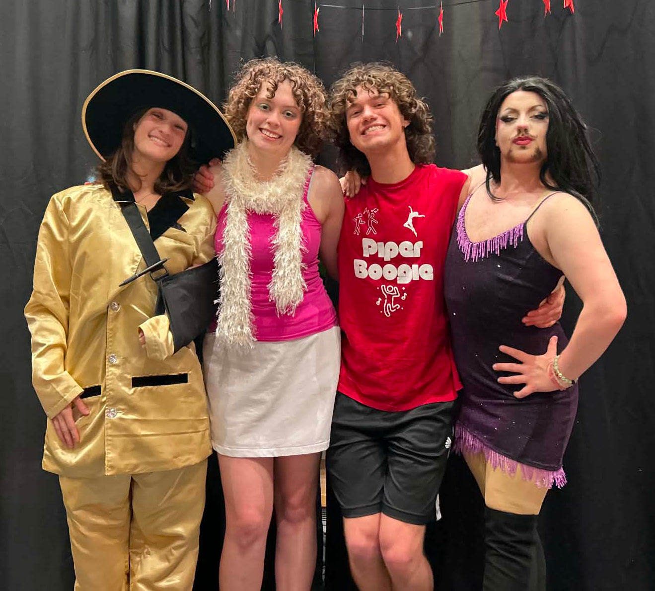 Students dressed in costume at the Homecoming lip synch contest