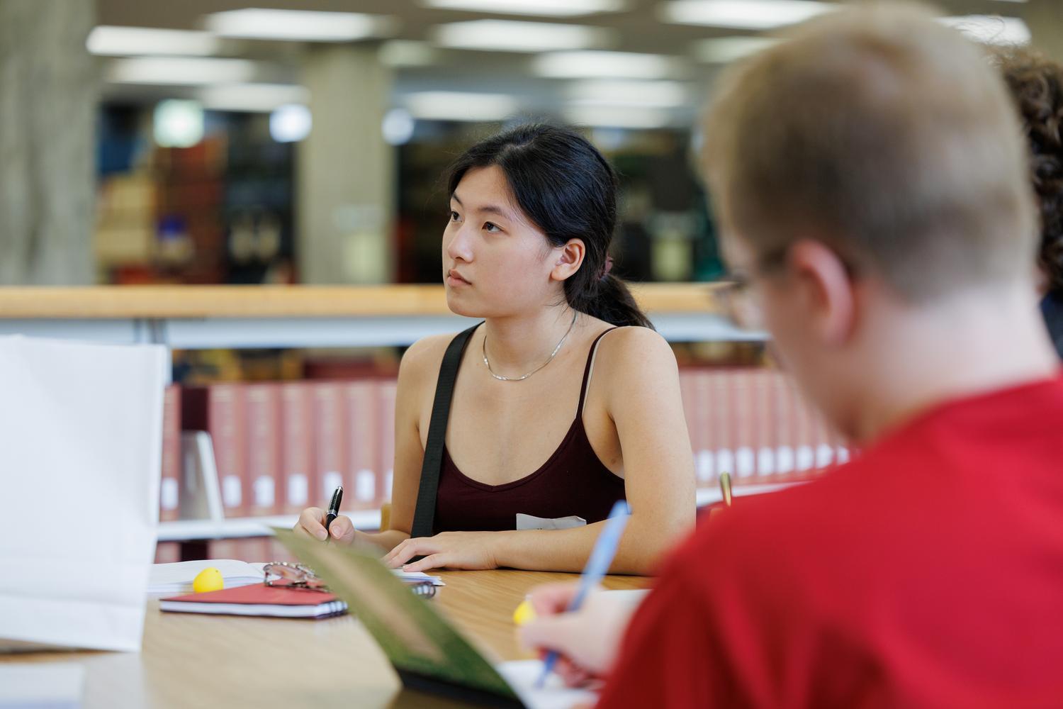 TRiO student doing homework