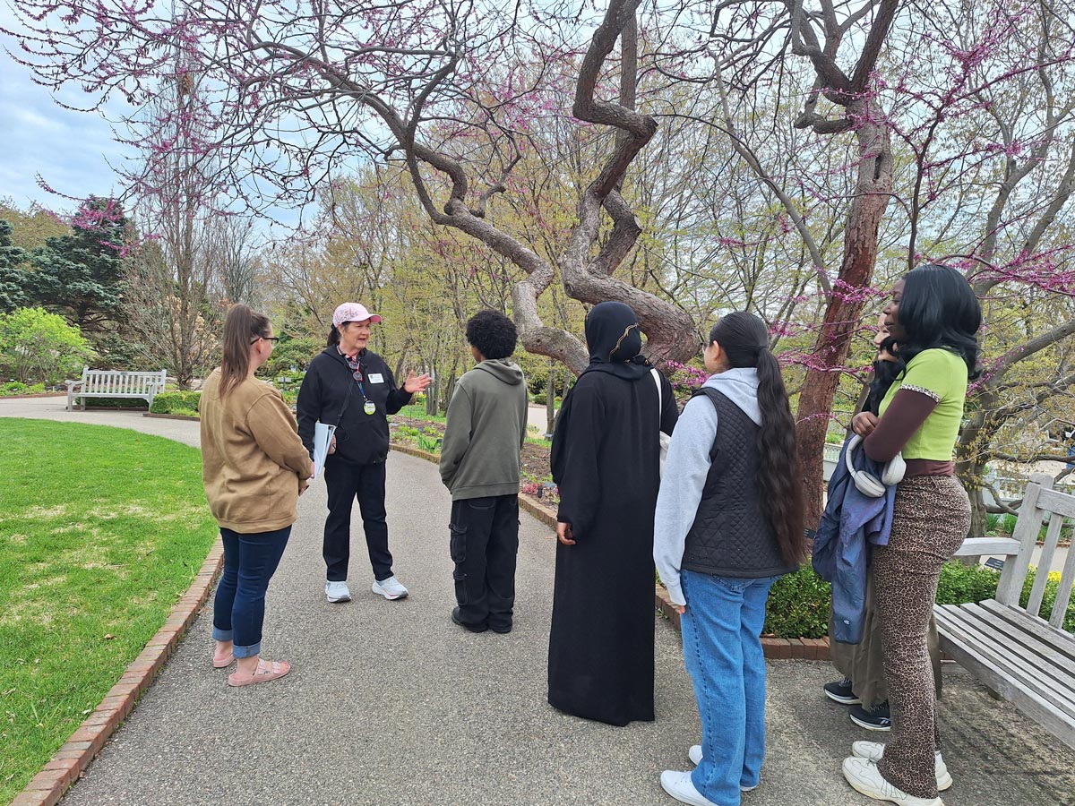 TRiO students with tour guide at MN Landscape Arboretum