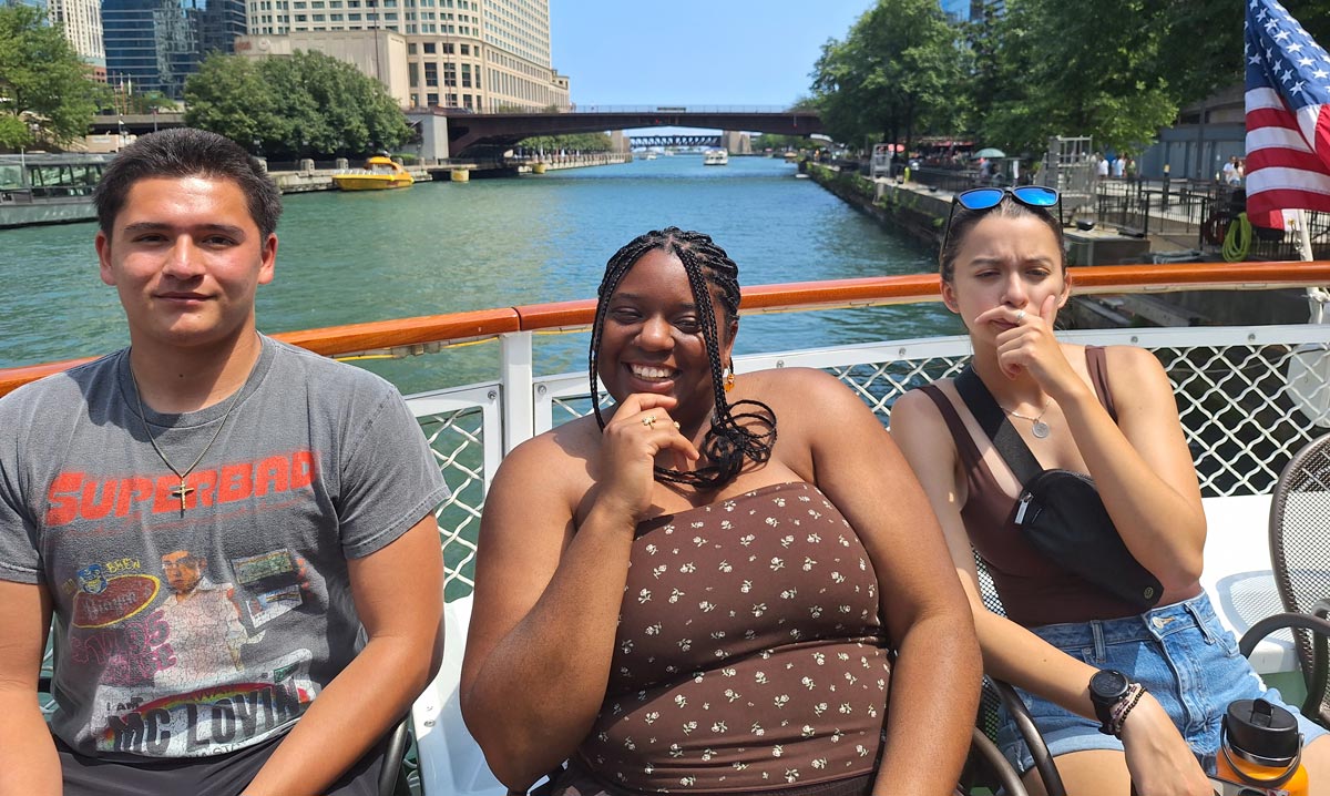 Three TRiO students on a boat ride