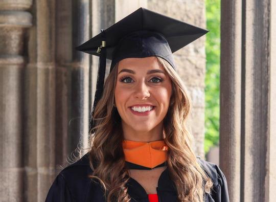 Hamline alumni Ann Muhvich in graduation cap and gown