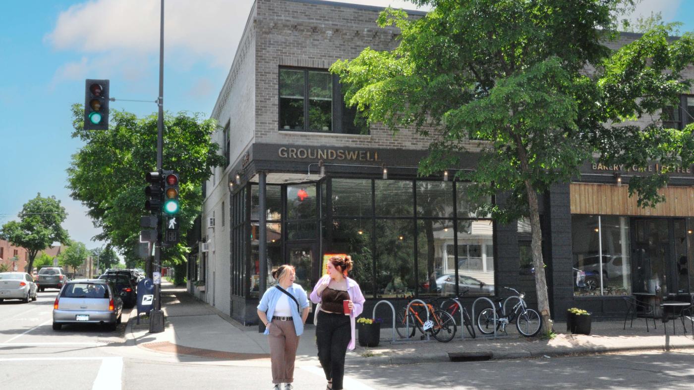 Hamline students in front of Groundswell Coffee in Hamline-Midway neighborhood