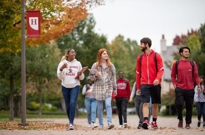 Students walking on Hamline campus