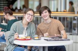 Two students dining at Piper Grill