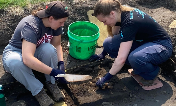 Students digging on a Hamline student organizations 