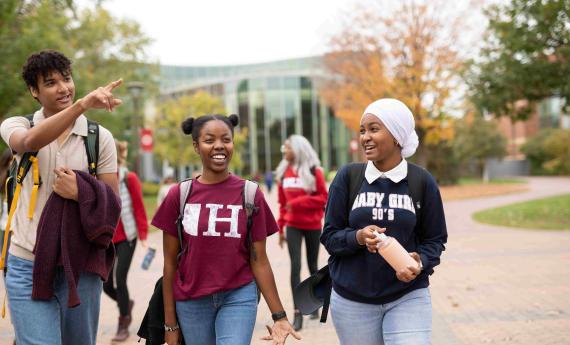 First Year Hamline Students are talking with each other at Hamline University.