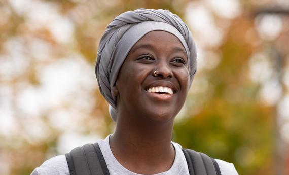 Asli Abdi a Hamline Student smilling to the picture