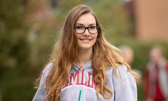 Hailey Belflower Hamline Transfer Student  holding a coffee at Hamline University