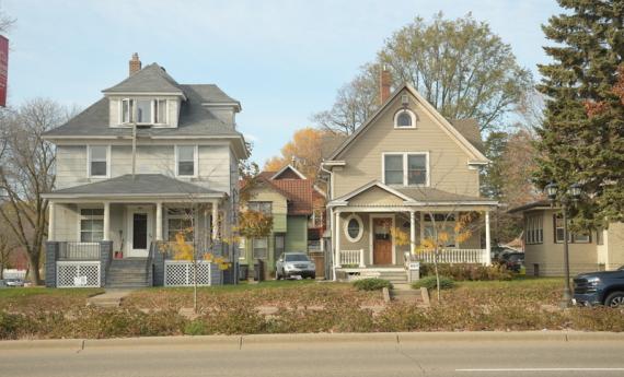 two houses located in the neighborhood surrounding Hamline University
