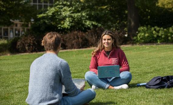 Two Hamline students talking at Hamline