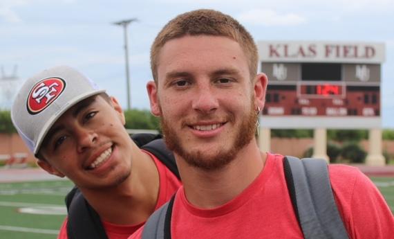 Photo of Caleb Lueders, right, at Klas Field