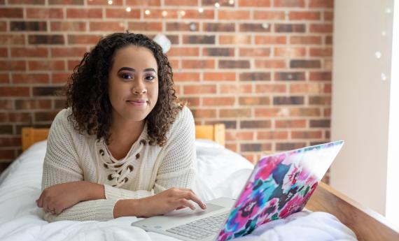 Photo of a Hamline student in a residence hall