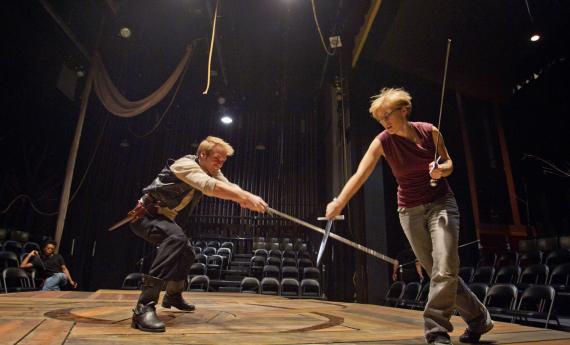 Performance, production, and community (theatre) program students on stage