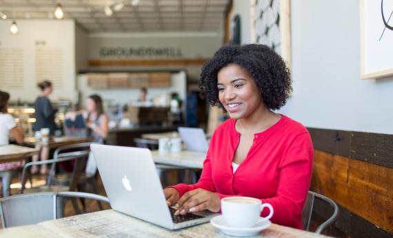 Online bachelor's degree completion student at coffee shop