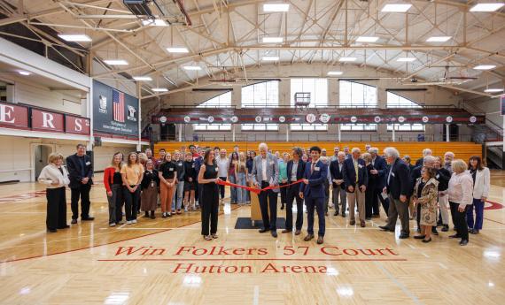 Dedication of Basketball Court after Alumnus Win Folkers '57
