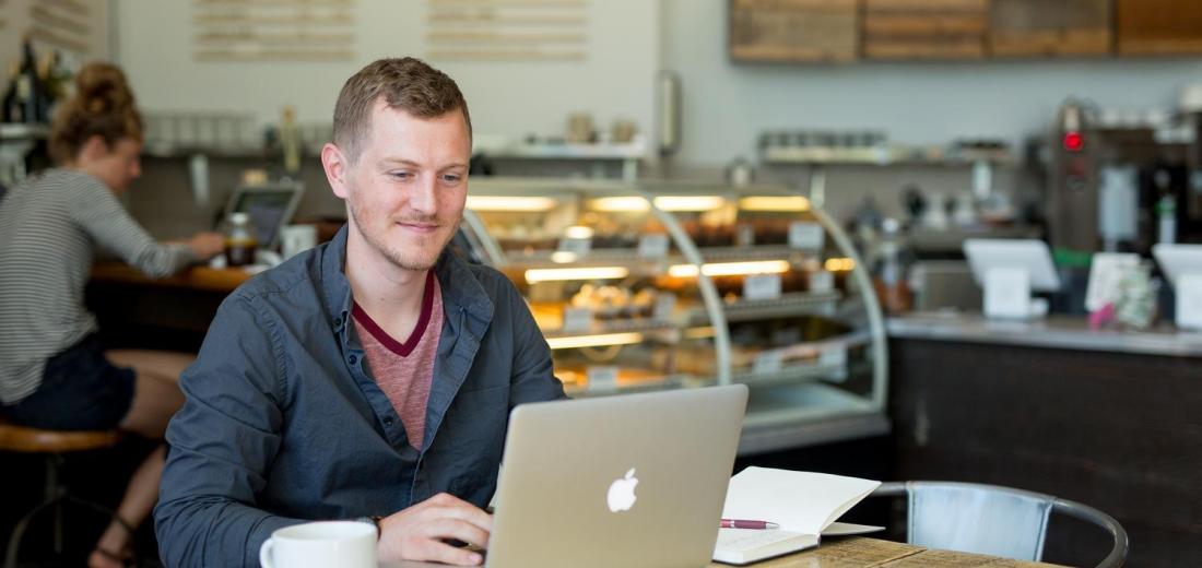 Online degree completion student at Groundswell coffee shop