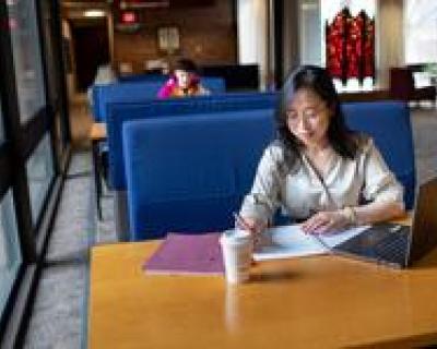 A student studies in Bush Memorial Library