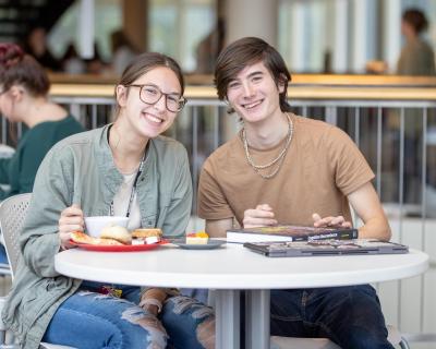 Two students dining at Piper Grill