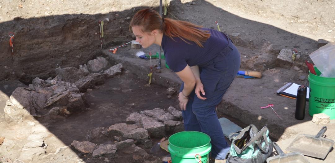 A hamline student working on an antropology project 