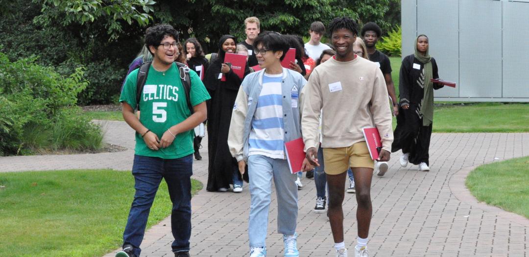 SOAR students (incoming freshmen) walking on campus at Hamline