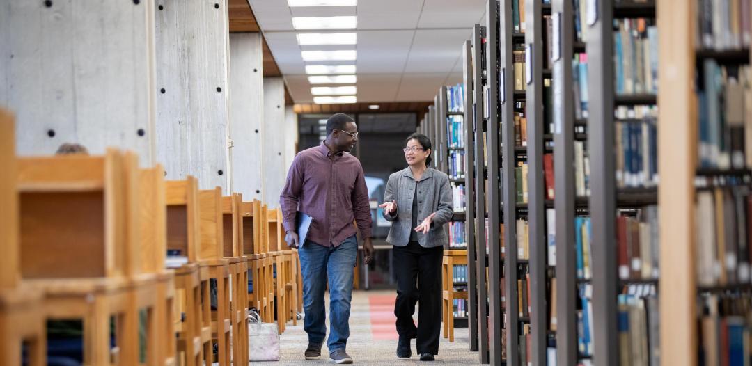 English and Communications Studies student and professor in library