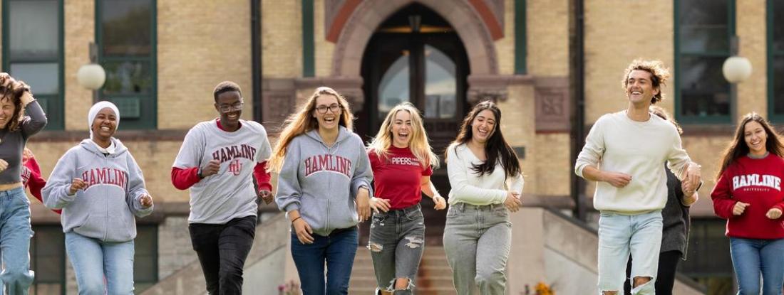 Happy Hamline Students in front of Old Main 