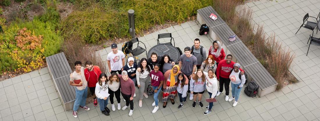 Bird's eye view of a group of Hamline's Hedgeman center students looking up at the camera