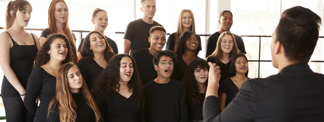 Group of people singing in a choir