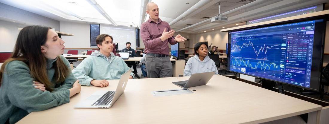 Students and professor at Hamline laboratory