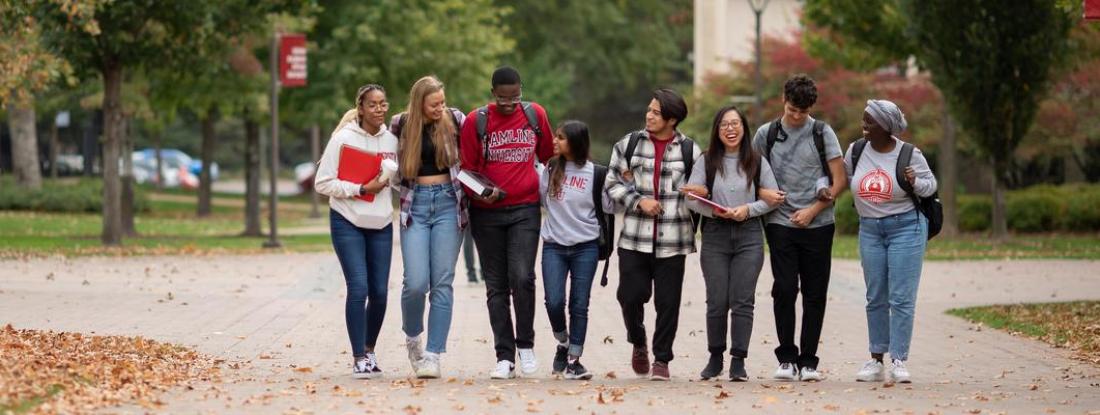 Students are walking and laughing with each other