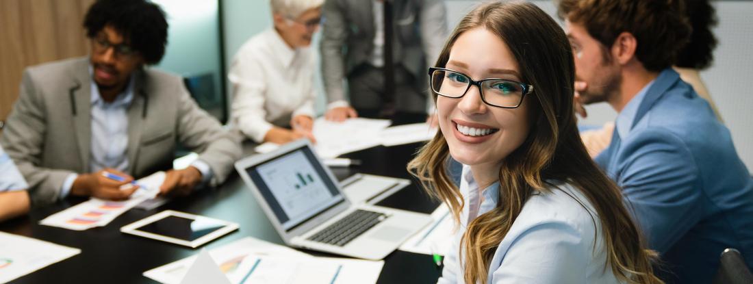Photo of young business professionals working together