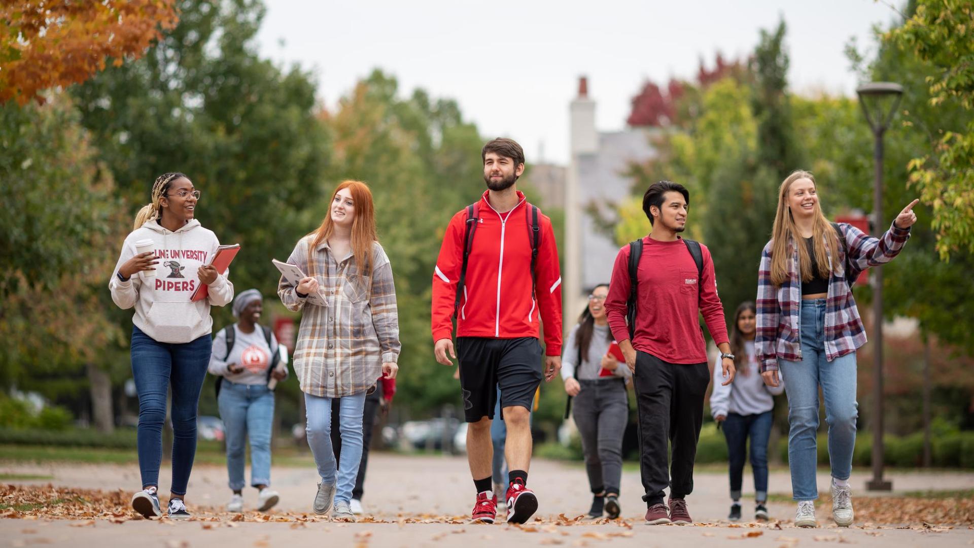 Students walking in front of Old Main
