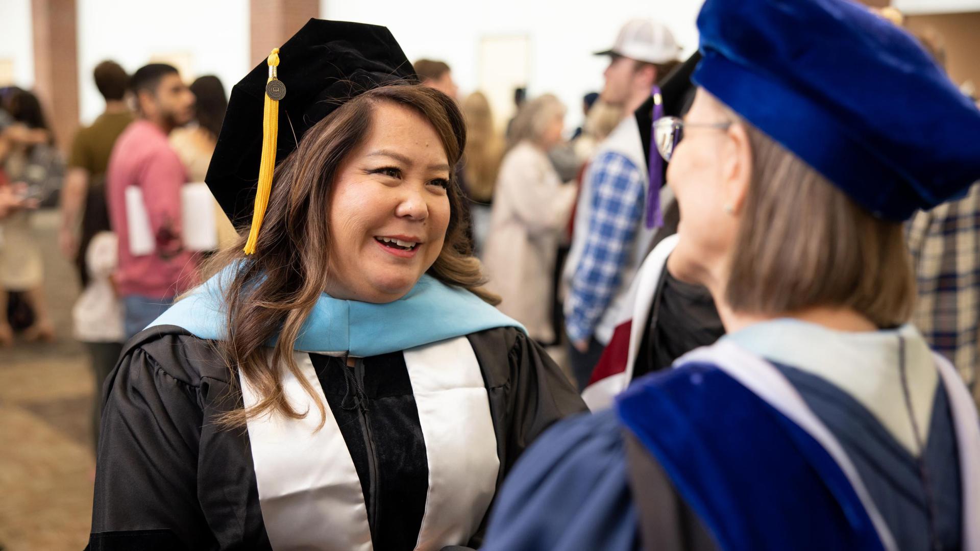 Mai Nhia graduating from the EdD program (Doctorate in Education at Hamline)