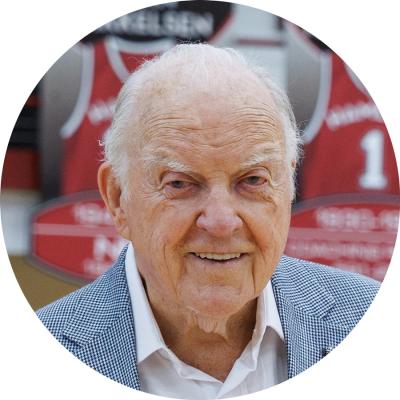 Win Folkers '57 Hamline alumni, at dedication of basketball court to his name