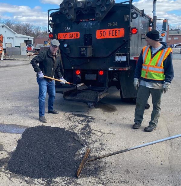 Professor Davies Shoveling Asphalt